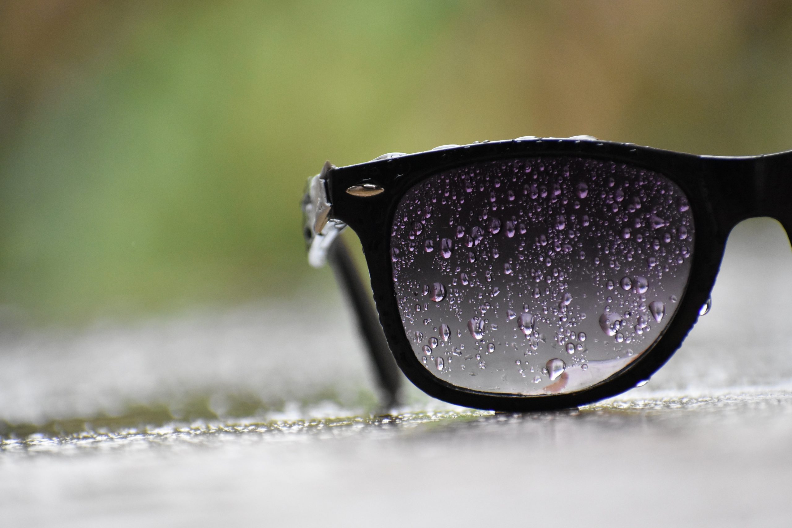 black-sunglasses-with-water-droplets